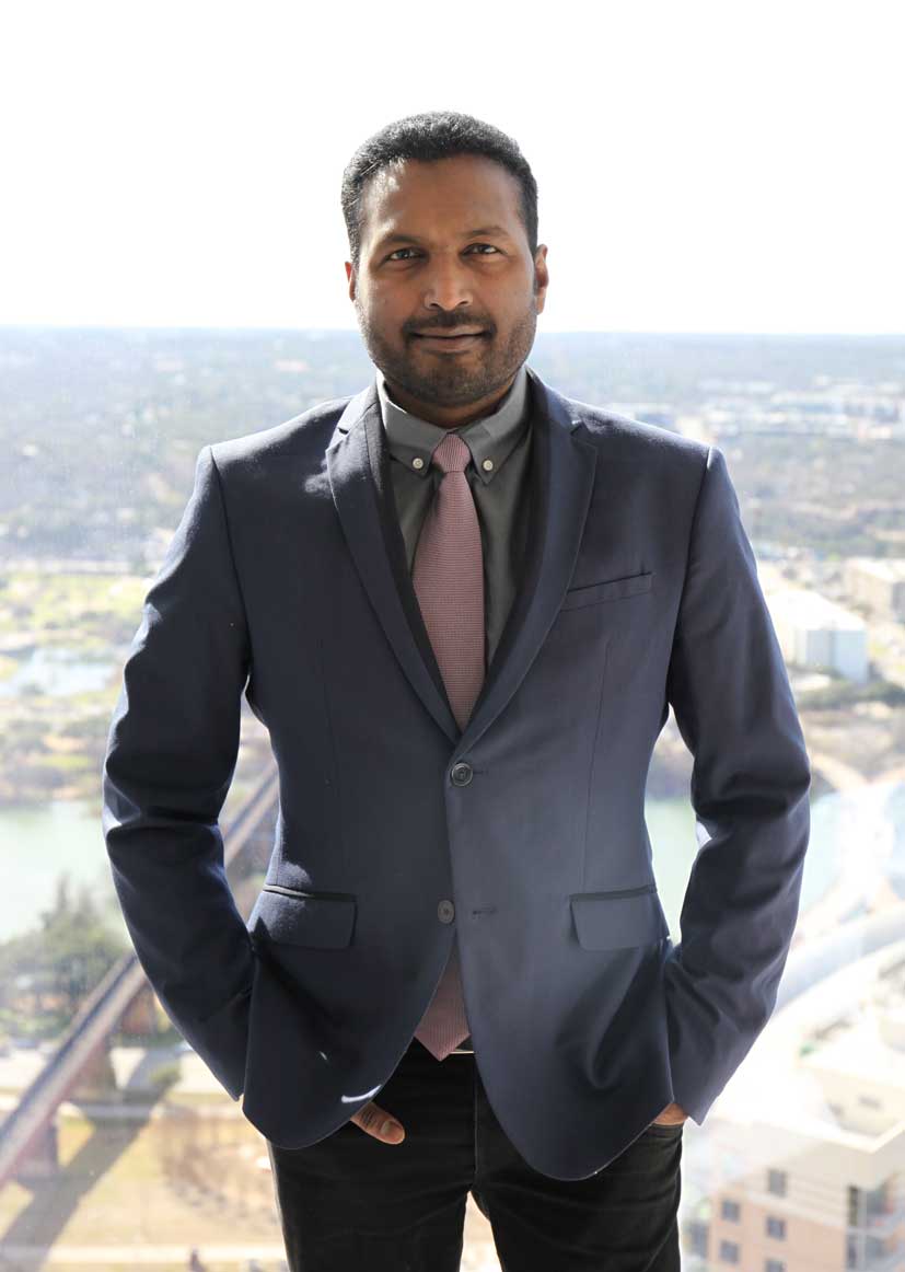 Shravan Parsi standing on balcony